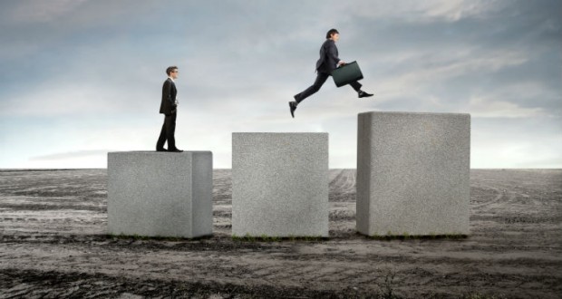 bigstock-Businessmen-on-stone-cubes-adv-24644240